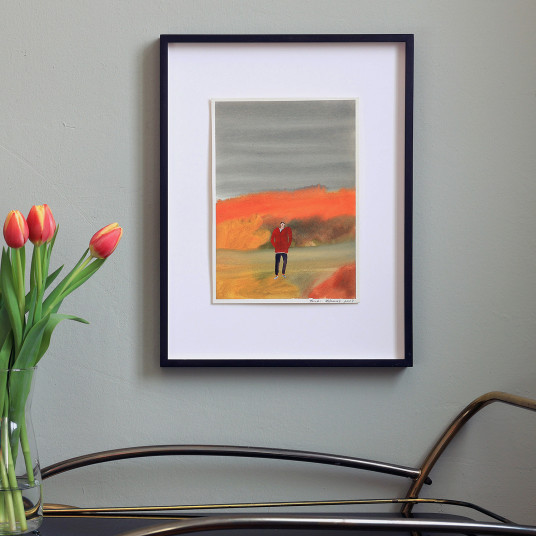 A man is under the cloudy sky