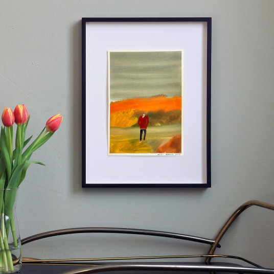 A man is under the cloudy sky